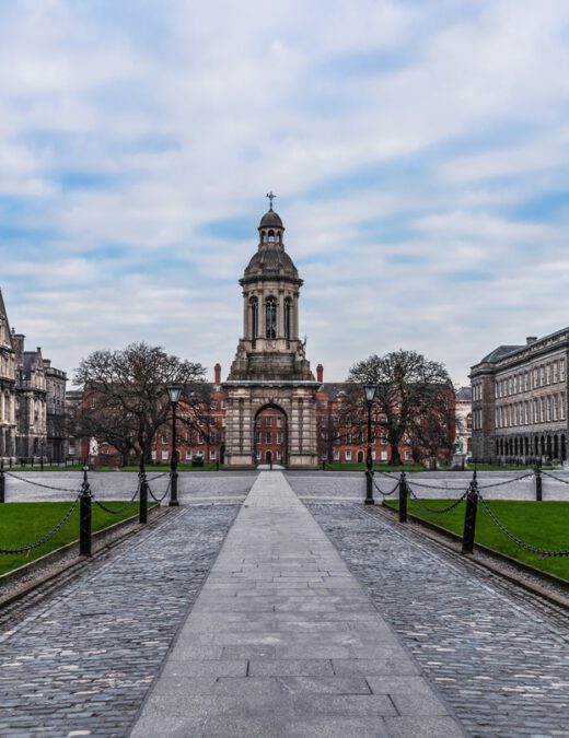 A paths leads to a tower in the centre of the image showing the TCD campus in Dublin